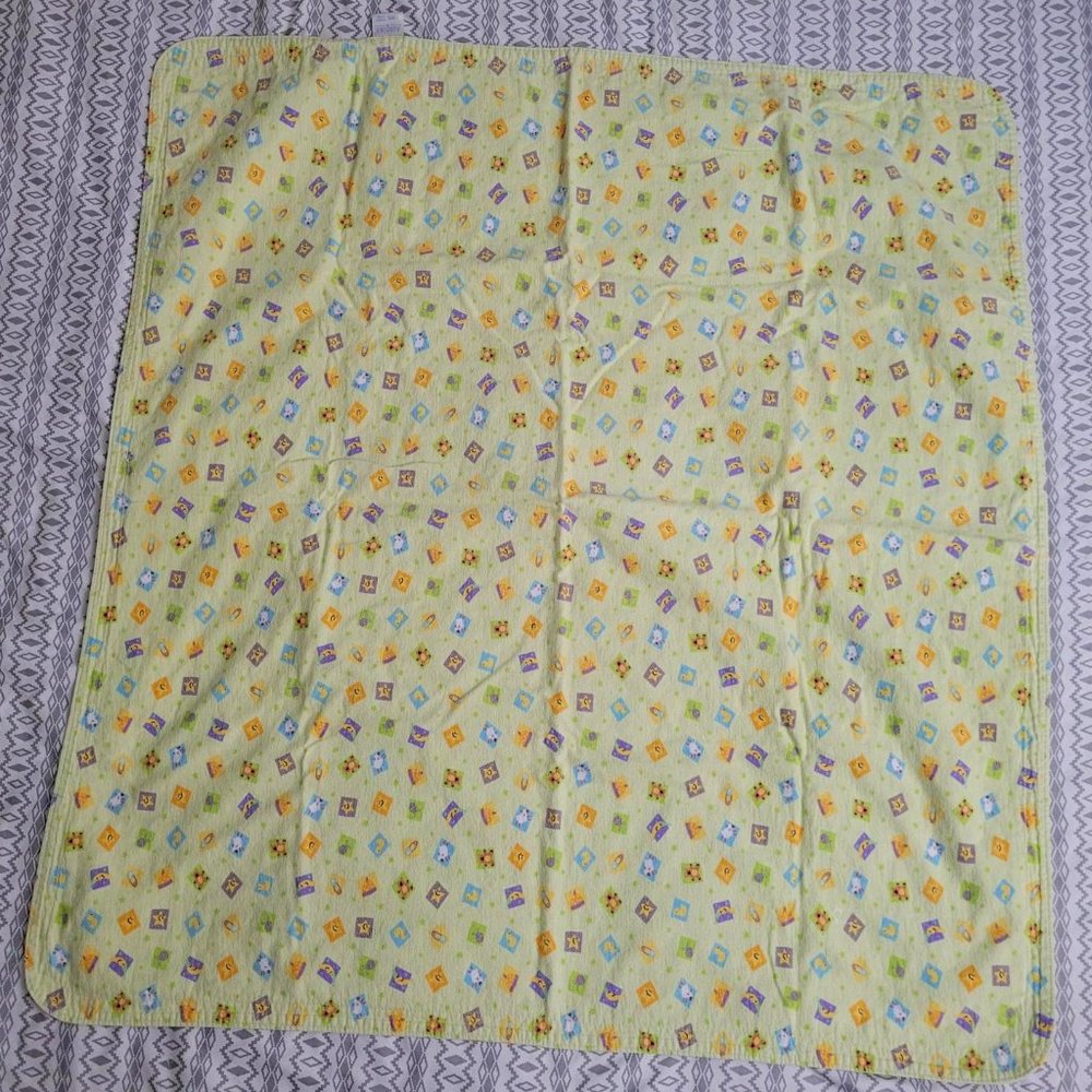 Reversible baby blanket. 36.5 inches x 39 inches.